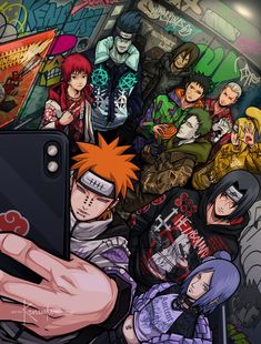 a person taking a photo with their cell phone in front of a bunch of anime characters