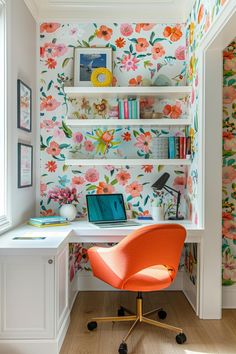 an orange chair sitting in front of a white desk