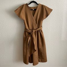 Measurements Available Upon Request. Please Message Me With Any Questions And Check Out My Other Items To Bundle And Save Chic Brown Knee-length Midi Dress, Khaki Knee-length Dress For Day Out, Spring Khaki Belted Dress, Fitted Khaki Midi Dress For Work, Brunch Knee-length Brown Midi Dress, Brown Knee-length Midi Dress For Brunch, Chic Khaki Workwear Dress, Casual Brown Belted Dress, Brown Tie Waist Midi Dress For Spring