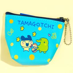 Store your loose change and small accessories in this super cute mini pouch! It features a print of Mametchi, a Tamagotchi character. You can even attach this pouch to your backpack using the ball chain! Made of PVC Comes from the Tamagotchi Lovely series Playful Zipper Pouch For Daily Use, Cute Multicolor Coin Purse For Personal Use, Cute Portable Coin Purse For Daily Use, Portable Pouch Coin Purse For School, Portable Coin Purse Pouch For School, Kawaii Coin Purse Pouch For Daily Use, Kawaii Coin Purse For Daily Use, Kawaii Pouch Coin Purse For Daily Use, Kawaii Portable Pouch For Everyday Use