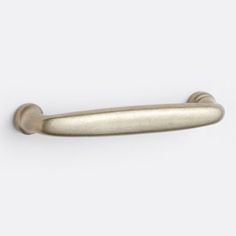 an antique brass door handle on a white background