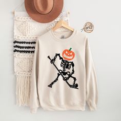 Fall Skull Print Crew Neck Hoodie, Halloween Cotton Sweatshirt With Skull Design, Halloween Fleece Sweatshirt With Crew Neck, Halloween Fleece Crew Neck Sweatshirt, Halloween Fleece Sweatshirt With Long Sleeves, Halloween Fleece Long Sleeve Sweatshirt, Halloween Long Sleeve Fleece Sweatshirt, Hockey Pumpkin, Autumn Hoodie