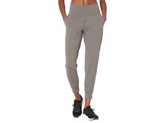 Under Armour Meridian Joggers - Women's Casual Pants : Fresh Clay/Metallic Silver : Get the most out of your workout wardrobe with the Under Armour Meridian Joggers. All Under Armour Apparel features a tagless design or tear-away tag with no left-over pieces. • Four-way stretch maintains full range of motion. Pull-on styling with an elasticized waistband. Stretch material wicks away sweat and dries quickly for comfort. Anti-odor process prevents the growth of odor properties. Under Armour logo a Gray Activewear For Gym, Gray Activewear With Ribbed Waistband For Gym, Gray Activewear With Ribbed Waistband For Workout, Moisture-wicking Bottoms For Yoga, Gray Athleisure Activewear With Elastic Waistband, Versatile Moisture-wicking Sweatpants For Workout, Gray Activewear With Comfort Waistband, Sporty Mid-rise Moisture-wicking Pants, Athletic Fit Bottoms With Pockets For Sports