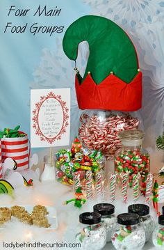 a table topped with lots of candy and candies