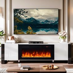 a living room with a fire place in the center and a large painting on the wall