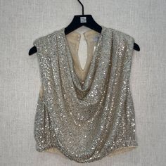 Brand: Seek The Label Jocelyn Sequin Top Size: Small Color: Ivory Silver Condition: Brand New W/ Tags Silver Sleeveless Top For Wedding, Glamorous Gold Top For Wedding, Silver Tops For Summer Wedding, Elegant Gold Top For Celebration, Silver Wedding Tops For Summer, Summer Wedding Silver Tops, Elegant Silver Tops For Wedding, Elegant Silver Wedding Top, Elegant Silver Wedding Tops