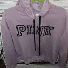 Nwot Pink Sweatshirt With Drawstring Hoodie And Zips Halfway Up Says Pink In Black. On Front Cropped A Little So Cute Wish It Fit Me Size X-Large 60% Cotton 40 Polyester Smoke Free Home Purple Letter Print Hoodie For Fall, Purple Hoodie With Letter Print For Fall, Purple Letter Print Sweatshirt, Sporty Purple Hoodie With Letter Print, Sporty Purple Hoodie Sweatshirt, Casual Purple Fleece Top, Purple Fleece Hoodie Top, Purple Fleece Hoodie Sweatshirt, Purple Drawstring Hood Sweatshirt For Fall