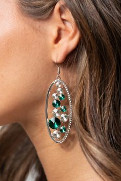 An oversized collection of glassy white and glittery green rhinestones sparkle inside a silver oval frame. One side of the frame is encrusted in dainty white rhinestones, adding a refined flair to the bubbly lure. Earring attaches to a standard fishhook fitting. Sold as one pair of earrings. P5ST-GRXX-018XX Green Earring, Oversized Earrings, Silver Frames, Rock Candy, Paparazzi Accessories, Red Earrings, White Rhinestone, Red Rhinestone, Oval Frame