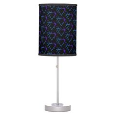 a table lamp with a black and blue pattern on it