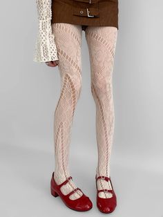 Elevate your style with these Beige/Brown/Black Floral Pattern Cut-out Fishnet Tights. Crafted with intricate floral patterns and delicate cut-out designs, these tights offer a perfect blend of sophistication and allure. The versatile color options - beige, brown, and black. Thigh High Fishnet Lace Legwear, Fitted Beige Stockings For Spring, Spring Fitted Lace Hosiery, Fishnet Lace Legwear, Spring Lace Tight Legwear, Fitted Lace Fishnet Legwear, Spring Lace Fitted Tights, Spring Tight Fit Beige Tights, Spring Fishnet Thigh High Tights