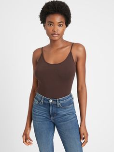 Essential Layering Camisole | Banana Republic Everyday Cotton Tank Top With Built-in Bra, Everyday Camisole Tank Top With Built-in Bra, Everyday Modal Camisole With Scoop Neck, Camisole Tank Top With Built-in Bra For Layering, Modal Tank Top With Built-in Bra For Loungewear, Stretch Cotton Camisole With Built-in Bra, Seamless Camisole For Layering With Tank Straps, Bra-friendly Solid Cotton Camisole, Basic Seamless Camisole For Loungewear