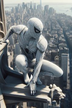 a spider - man is sitting on the edge of a building