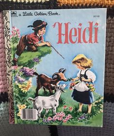 an old children's book with the title heidi written in english on it