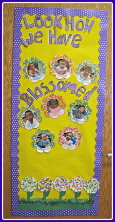 a bulletin board that says, look how we have blossoms on the front and back