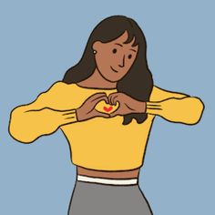 a woman with her hands on her chest holding a heart in the shape of a heart