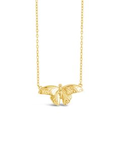 Indulge in the beauty and grace of our Rowena Butterfly Pendant Necklace. This exquisite piece boasts a delicate butterfly charm, suspended on a sleek pendant necklace. Let this elegant accessory be a symbol of your own transformation and free spirit. Elevate any outfit with this luxurious addition to your jewelry collection. Material: 14K gold or rhodium plated brass Features: Measures 16" with 2" extender, 1" pendant, 1.5mm chain, Lead & Nickel free, lobster clasp Elegant Pendant Necklace With Butterfly Charm, Elegant Butterfly Charm Pendant Necklace, Butterfly Shaped Necklace With Delicate Chain, Elegant Butterfly Charm Necklace With Adjustable Chain, Elegant Butterfly Shaped Jewelry With Adjustable Chain, Elegant Round Pendant Necklace With Butterfly Charm, Elegant Butterfly Charm Choker Necklace, Dainty Pendant Necklace With Butterfly Charm, Dainty Butterfly Charm Pendant Necklace