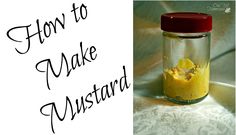 a jar filled with yellow liquid sitting on top of a white table next to a sign that says how to make mustard