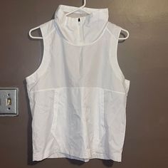 Brand New With Tags. Women’s Under Armour Loose Fit Vest Size Small. Color Is White. Retail Price As Shown On Attached Tag Is $49.99. Smoke Free Home. Casual Under Armour Tops For Outdoor, Functional White Sports Vest, White Sports Vest Activewear, White Workout Vest Activewear, White V-neck Vest With Pockets, White Sporty Moisture-wicking Vest, Pullover Vest, Lightweight Vest, Black Puffer Vest