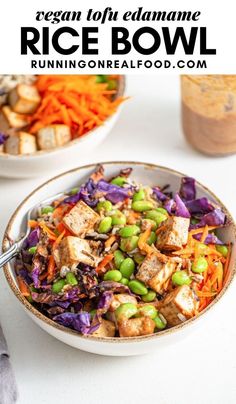 a white bowl filled with vegetables and tofu