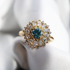 Dandelion Blue Diamond Ring | Tippy Taste Jewelry Luxury Timeless Birthstone Ring With Diamond Accents, Luxury Bohemian Blue Ring, Luxury Blue Diamond Ring Classic Style, Timeless Blue Diamond Ring Luxury, Timeless Luxury Blue Diamond Ring, Luxury Heirloom Wedding And Engagement Jewelry With Gemstones, Luxury Vintage Blue Rings, Luxury Blue Diamond Heirloom Ring, Luxury Heirloom Blue Diamond Ring