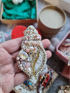 Excited to share the latest addition to my #etsy shop: Shell beaded gemstone brooch, Sea embroidery art, Natural gift for her https://etsy.me/355km6e #beige #birthday #fathersday #beachtropical #pink #opal #unisexadults #artdeco #beadedbrooch Unique Rhinestone Brooch For Gift, Pink Beaded Brooches For Party, Multicolor Embellished Jewelry Gift, Multicolor Embellished Jewelry As Gift, Multicolor Embellished Jewelry As A Gift, Pink Beaded Party Brooches, Handmade Multicolor Brooches For Wedding, Bohemian Beaded Brooch For Party, Bohemian Beaded Brooches For Parties