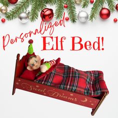 an elf is sleeping in his bed under the christmas tree