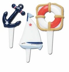 three different shaped items on sticks with one boat, the other an anchor and a life preserver