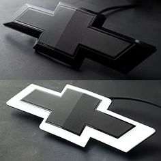 the chevrolet logo is shown in black and white, as if it were made out of metal