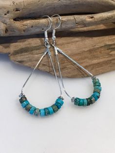 These beautiful earrings have a fun boho style! Made with Silver Teardrop hoop wires with gorgeous 4mm heishi imperial jasper stone beads in bold bright blue turquoise and beige brown!  The earring itself measures  approximately 2 inches in length by one inch wide. The ear wires are lead and nickel free.  Beautiful statement earrings that can be dressed up or down and worn throughout the year! Bold, beautiful boho style!! Your Boho style earrings will come packaged in a pretty gift box, ready fo Bohemian Nickel-free Heishi Beads Earrings, Handmade Blue Heishi Beads Earrings, Bohemian Blue Wire Wrapped Hoop Earrings, Bohemian Turquoise Hoop Earrings For Beach, Turquoise Bohemian Hoop Earrings For Beach, Turquoise Dangle Hoop Earrings With Colorful Beads, Bohemian Turquoise Hoop Earrings Nickel Free, Blue Bohemian Dangle Hoop Earrings, Bohemian Blue Dangle Hoop Earrings