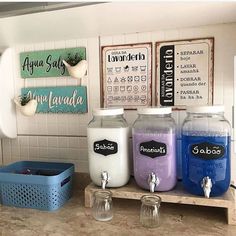 there are many jars on the counter in this kitchen