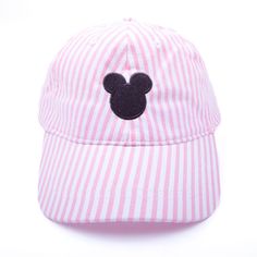 This Kids Mouse Ears Hat is the perfect way to protect your little one from excessive sun exposure while visiting the magical amusement park. The hat features an embroidered mouse ears and provides UPF 50+ protection to keep your toddler safe in the sun. It's a perfect accessory for playtime or sports. Available in a variety of colors to suit your style, you can personalize it with a monogram on the side for that extra special touch. Featuring a Velcro adjustable strap for a customized fit, it ensures comfort and convenience. Hat is sized to fit 2T to 4T Velcro adjustable strap Adjustable Cotton Mickey Mouse Hat, Adjustable Minnie Mouse Cap, Cute Adjustable Hats With Uv Protection, Mickey Mouse Baseball Cap, One Size Fits Most, Cute Adjustable Baseball Cap, Cute Adjustable Brimmed Baseball Cap, Fun Mickey Mouse Themed Hat One Size Fits Most, Adjustable Mickey Mouse Fun Hat, Playful Style Adjustable Baseball Cap With Curved Brim