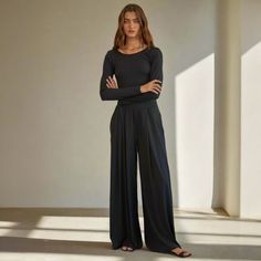 Luxurious Knit High Waisted Wide Leg Pants crafted with Polyester and Spandex, featuring elegant side pockets for added convenience. Pair with The Finley Top for the perfect elegantly casual set! Fabric: 65% POLYESTER 26% RAYON 9% SPANDEX Fit: Slightly large S fits sizes 2-6 M fits sizes 6-10 L fits sizes 10-14 Model is wearing a size Small High Waisted Wide Leg Pants, Pants Large, Loungewear Set, Casual Sets, Large Black, Leg Pants, Wide Leg Pants, Scrubs, How To Look Better