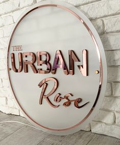 a sign that says urban rose on it