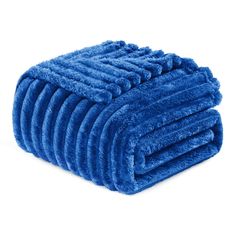 a blue blanket folded on top of each other