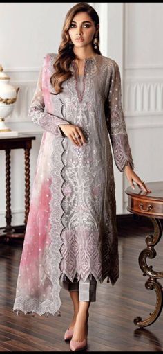 Presenting the Al Amara stitched dress with handcrafted work and detailed embroidery to make you look absolutely stunning this Eid! Organza Sleeves, Net Dress, Pakistani Salwar Kameez, Chiffon Collection, Maria B, Organza Dupatta, Pakistani Designers, Suit Fabric, Pakistani Outfits