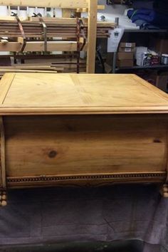 a large wooden box sitting on top of a table