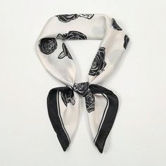 Elevate your style with our Chic and Versatile Printed Small Square Scarf for Fashionistas. This impeccably designed scarf is the perfect addition to any outfit, offering both fashion and function. Made with high-quality materials, it's lightweight and easy to style in multiple ways. Embrace your inner fashionista with this must-have accessory. Color : Black and White Material : Polyester Composition : 100% Polyester Element : Plants Product Technique : Printing Length Width 27.6 27.6 Black Silk Scarf As Summer Gift, Black Silk Scarf For Summer Gift, Black Silk Scarf For Spring Gift, Chic White Scarves As Gift, Trendy Black Scarf As Gift, Chic White Scarf As Gift, Chic White Scarf For Gift, Chic White Scarf As A Gift, Chic Black Scarf For Gift