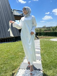 Made from acetate satin fabric. Height from shoulder is 140 centimeters. It has a hidden zipper at the back. Lined and belted Model dimensions: Size: FR 36 / US 6 Message us to find your correct size White Embellished Abaya For Wedding, Satin Abaya For Wedding And Eid, Women Wedding Dress, Dress Muslim, Womens Wedding Dresses, Muslim Dress, Muslim Women, Dress Clothes For Women, Satin Fabric