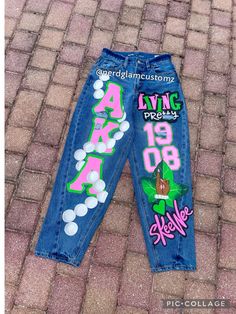 BUYER MUST PROVIDE THEIR OWN JEANS All artwork is hand painted and can be customized to your liking with any fraternity or sorority. Message me if you have any questions.  Once payment is received, you will receive shipping address. Please allow up to 6 weeks (this does not include the time it takes to be ship to you) for completion, starting from the date your jeans have been marked delivered to me. If you need it sooner, please message us to confirm availability. Homecoming Pants Decorated, Spirt Jeans, Homecoming Jeans Decorated, Spirit Jeans Ideas, Aka Jeans, Jeans Template, Decorating Jeans, Homecoming Overalls, Homecoming Jeans