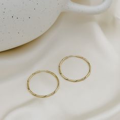 Elevate your look with the Collins hoops - an elegant twist on classic gold infinity hoops. A refined essential for the classic ‘hoop girl’. 18k gold filled 30mm hoop Gold Medallion Necklace, Gold Medallion, Medallion Necklace, Twist Braids, Gold Wood, Classic Gold, Elevate Your Look, Wood Jewellery, Gold Filled