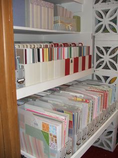 the shelves are filled with many different types of folders