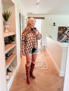 The colors in this flannel are absolutely gorgeous and the fit is perfect, with the front hitting shorter than the back. These boots are stunners - so flattering and versatile! I paired it all with jean shorts from Madewell that fit like a glove. Bad self-tanning job not included. Perfect for a warmer fall day and definitely for a trip to Nashville or any country vacay! #motherhoodstyle #countryoutfit #fallstyle

Country-style | fall style | flannel | jean shorts Flannel Jeans, Style Flannel, Fall Country, Beige Plaid, Early Fall Outfit, Fall Day, Warm Autumn, Country Outfits