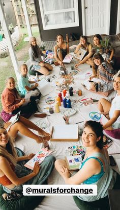 a group of young women sitting around a table with art supplies on it and the words we explore our creativity and learned some new techniques