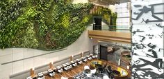 an indoor dining area with tables, chairs and plants on the wall above it that is covered in green foliage