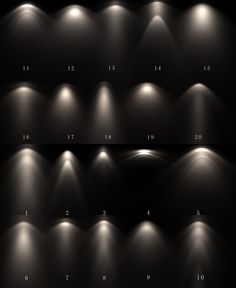 several spotlights are lit up on the wall in this black and white photo with numbers below them