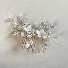 Silver & Matte White Floral Hair Comb. New In Box. Search The Keyword “Bridal” In My Closet To See My Other Wedding Related Listings. Bundle & Save! Tags: Jeweled, Wedding, Boho, Bhldn, Anthropologie, Mermaid, Princess Floral Hair Comb, Bridal Glam, Floral Hair Combs, Mermaid Princess, Wedding Boho, Floral Hair, Hair Comb, Comb, Anthropologie