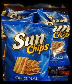 six bags of sun chips are stacked on top of each other