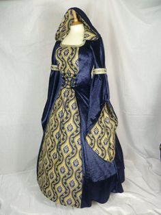 This is for a custom made dress,it will be made to the measurements you send me. Please send me your bust,waist and hip measurement,and please measure from the top of your shoulder to the floor with shoes on. Could you also send your bicep measurement thank you. It will be made with beautiful dark blue crushed velvet and stunning gold and blue jacquard.It will have a corset style front and back with dark blue lacing so you can adjust the dress to fit your body shape. Combined shipping on multiple items. If you purchase express shipping by courier please send me your phone number thank you. Medieval Wedding Dress, Medieval Dresses, Tale Dress, Dress With Hood, Custom Made Dress, Medieval Wedding, Made Dress, Royal Dresses, Medieval Costume