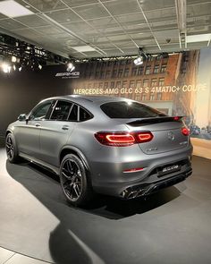 the mercedes glc is on display at an auto show