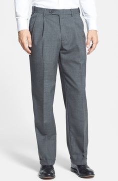 A classic pleated cut styles sharp cuffed trousers fashioned from a finely textured blend and fitted with a self-sizer waistband to ensure a custom fit. 18" leg opening; 12" front rise; 18" back rise (size 34x34). Self-sizer waistband expands up to 4" for added comfort. Zip fly with hook-and-bar closure. Front slant pockets; back button-closure welt pockets. Partially lined. Get the perfect fit—book an appointment with one of our alterations experts 55% polyester, 45% wool. Machine wash cold, tu Mens Pleated Trousers, Formal Trousers For Men, Trousers Outfit Men, Mens Pleated Pants, Mens Suits Navy, Cuffed Trousers, Pants Outfit Men, Black Men Fashion Swag, Casual Dress Pants